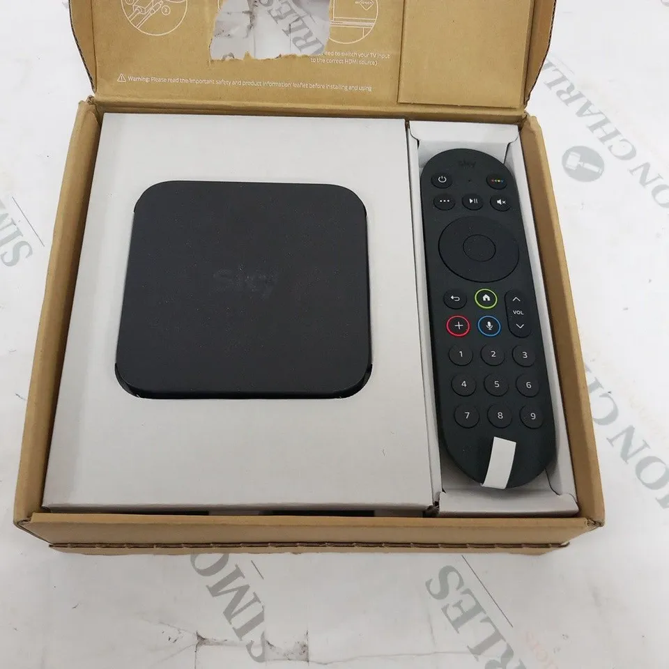 BOXED SKY STREAM TV PUCK STREAMING BOX