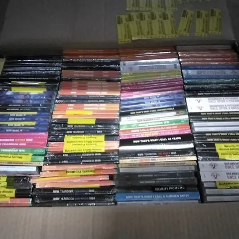 APPROXIMATELY 100 ASSORTED CDS AND DVDS TO INCLUDE NOW MUSIC 18, NOW YEARBOOK, AND NOW THAT'S WHAT I CALL ETC.