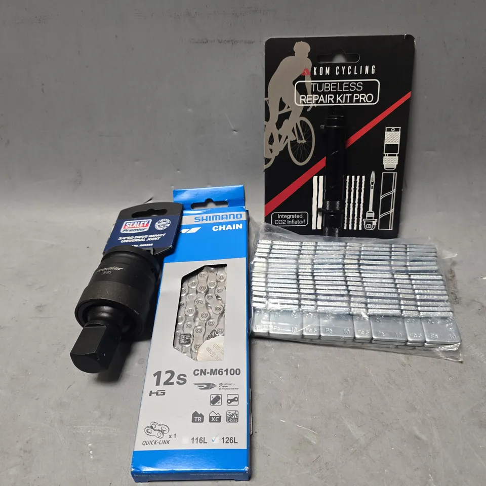 APPROXIMATELY 8 ASSORTED ITEMS TO INCLUDE - KOM CYCLING TUBELESS REPAIR KIT PRO , SHIMANO CHAIN , WHEEL BALANCING WEIGHTS ETC