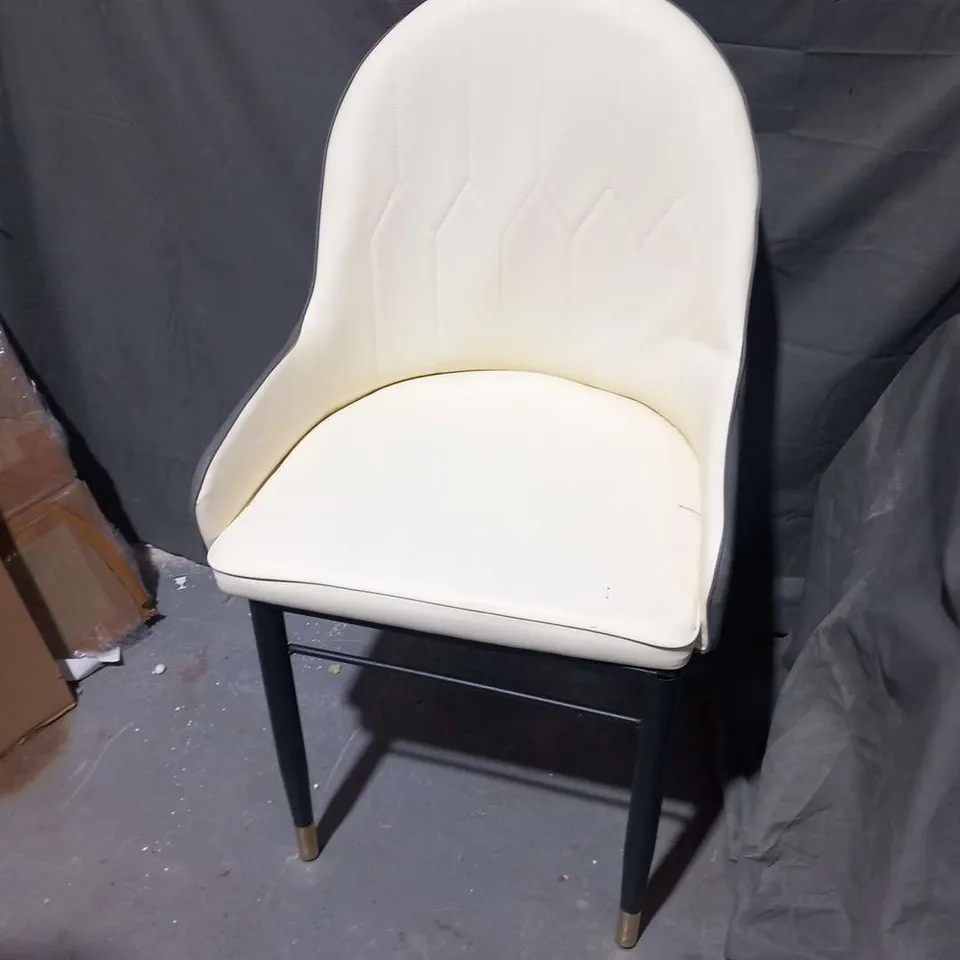 THREE FAUX LEATHER DINING CHAIRS