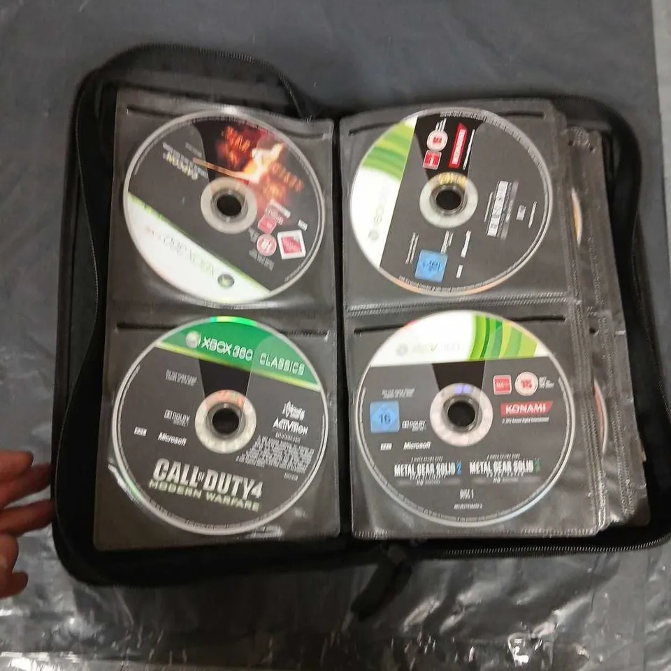 CD/GAME WALLET WITH APPROXIMATELY 50 ASSORTED XBOX 360 GAMES