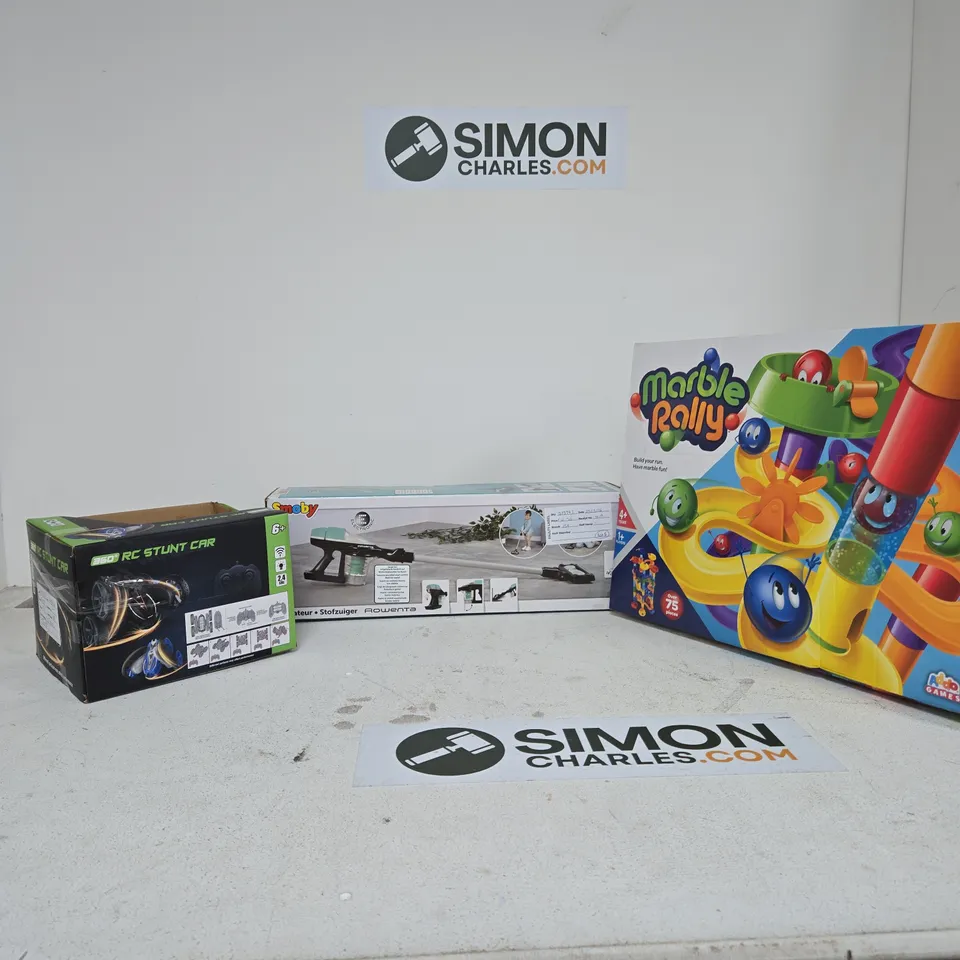 BOX OF APPROXIMATELY 4 TOYS INCLUDING MARBLE RALLY, RC STUNT CAR AND CHILDREN HOOVER