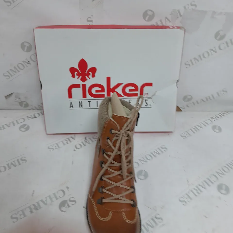 BOXED PAIR OF RIEKER WATER RESISTANT HIKING BOOTS IN BROWN ZIP UP SIZE 4