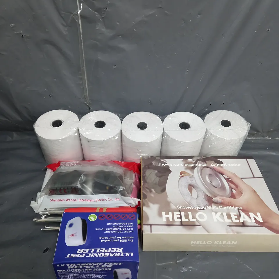 APPROXIMATELY 10 ASSORTED HOUSEHOLD ITEMS TOO INCLUDE STICKERS , REFIL CARTRIDGE , WALL SOCKET , ETC 