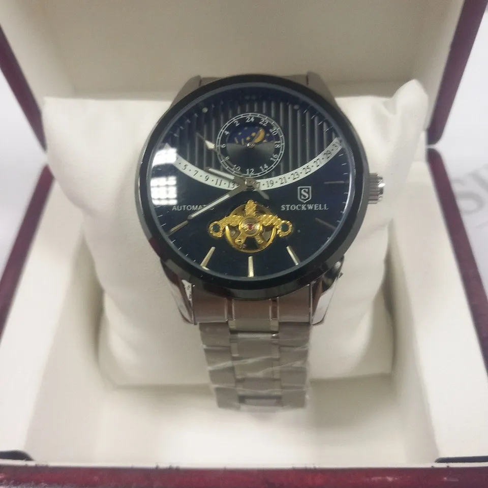 MEN’S STOCKWELL AUTOMATIC OPEN HEART WATCH WITH MOONPHASE MOVEMENT. STAINLESS STEEL STRAP.