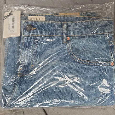 MOTEL LOW RISE PARALLEL JEANS IN BLUE SIZE W34/L32