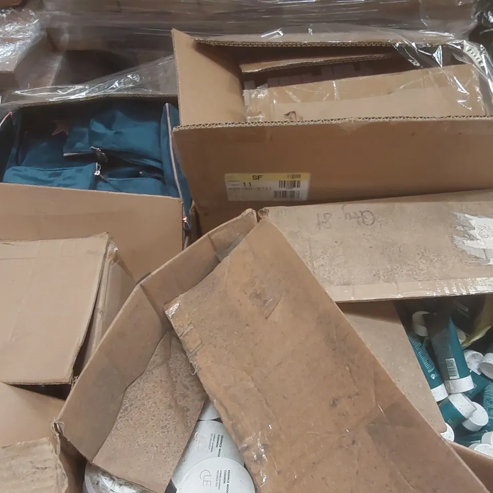 PALLET CONTAINING A VERY LARGE QUANTITY OF ASSORTED BEAUTY RELATED PRODUCTS INCLUDING: MOONLIGHTER CUSHION, MORNING STREET SHAMPOO, WASHABLE PAPER BAGS ECT
