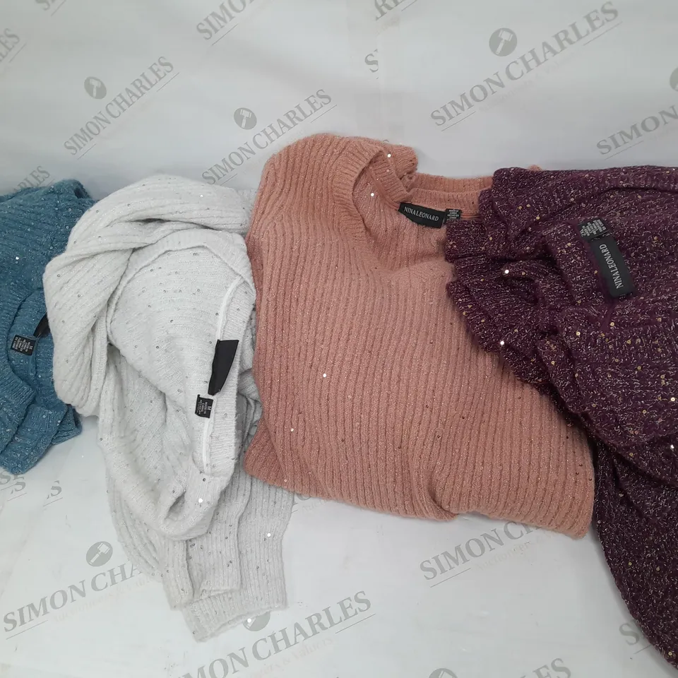 LARGE BOX OF ASSORTED CLOTHING ITEMS TOO INCLUDE TOPS , TROUSERS AND JUMPERS COMING IN DIFFERENT COLOURS AND SIZES 