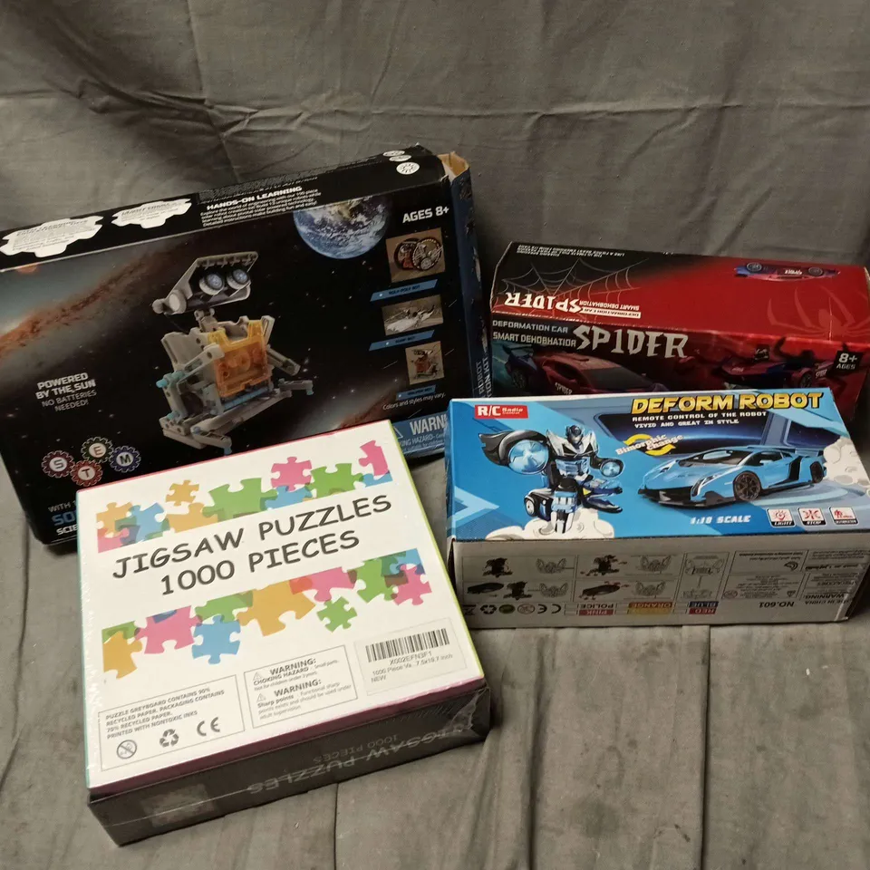 APPROXIMATELY 15 ASSORTED TOYS, GAMES, GIFTS AND NOVELTIES TO INCLUDE JIGSAW PUZZLE TOY, DEFORM ROBOT TOY, SPIDER DEFORMATION CAR, ETC - COLLECTION ONLY