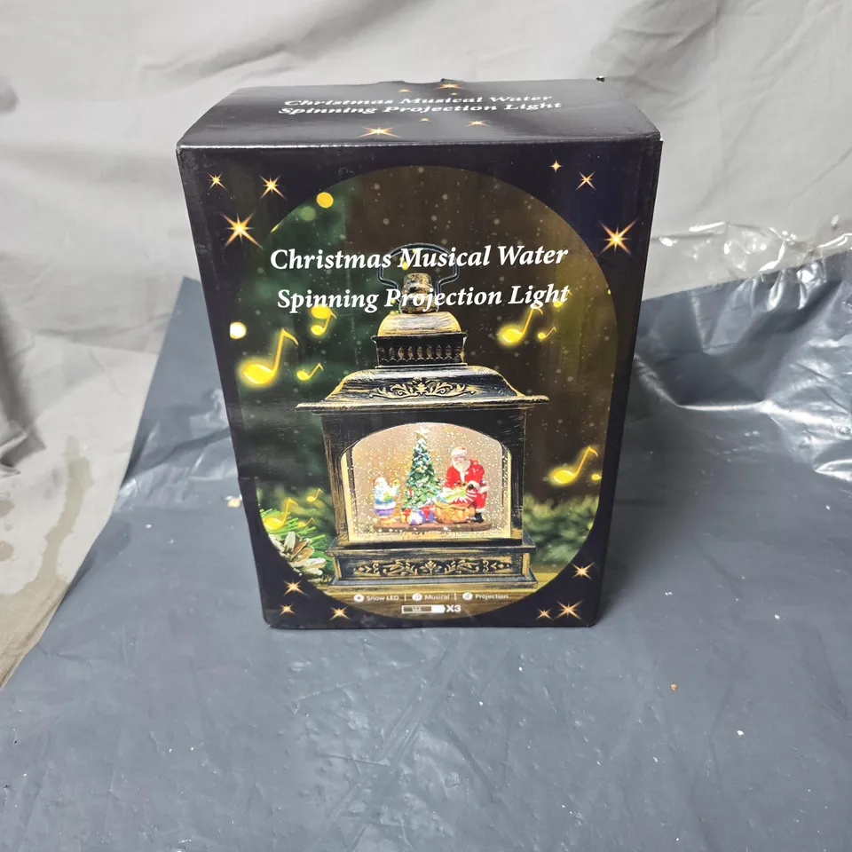 CHRISTMAS MUSICAL WATER SPINNING PROJECTION LIGHT ORNAMENT