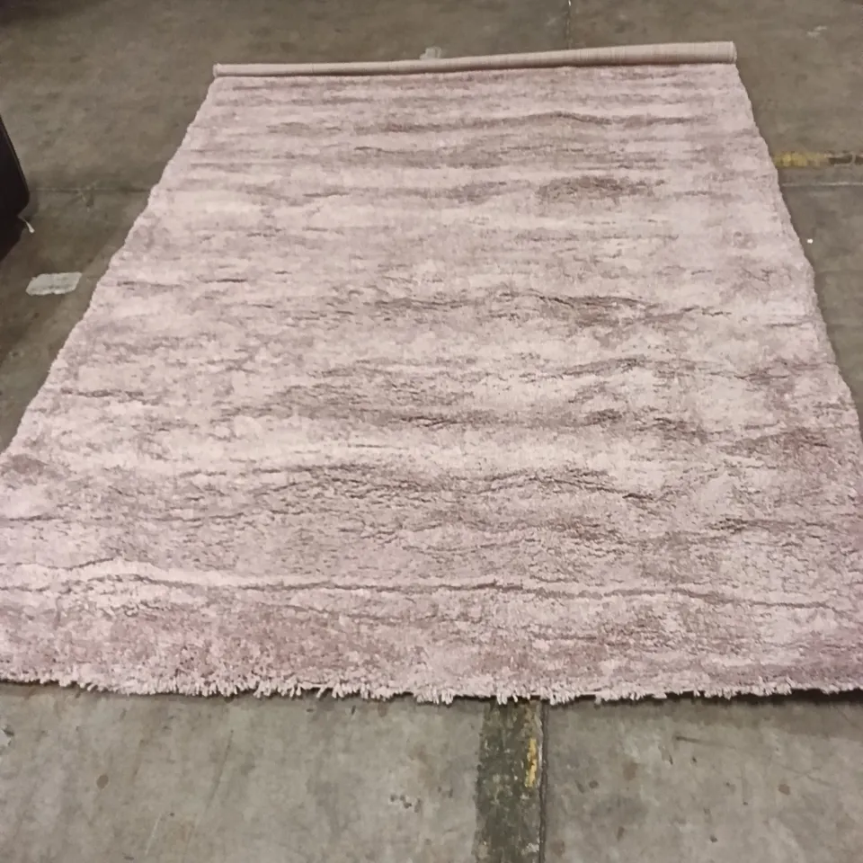 STILLAGE OF DESIGNER RUGS APPROXIMATELY 14 LARGE RUGS