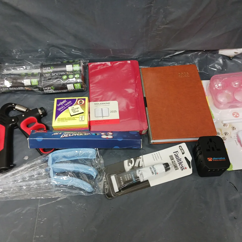 BOX OF APPROXIMATELY 8 ASSORTED ITEMS TO INCLUDE - DAY A PAGE DIARY, LINT ROLLER, AND STICKY NOTES ETC. 