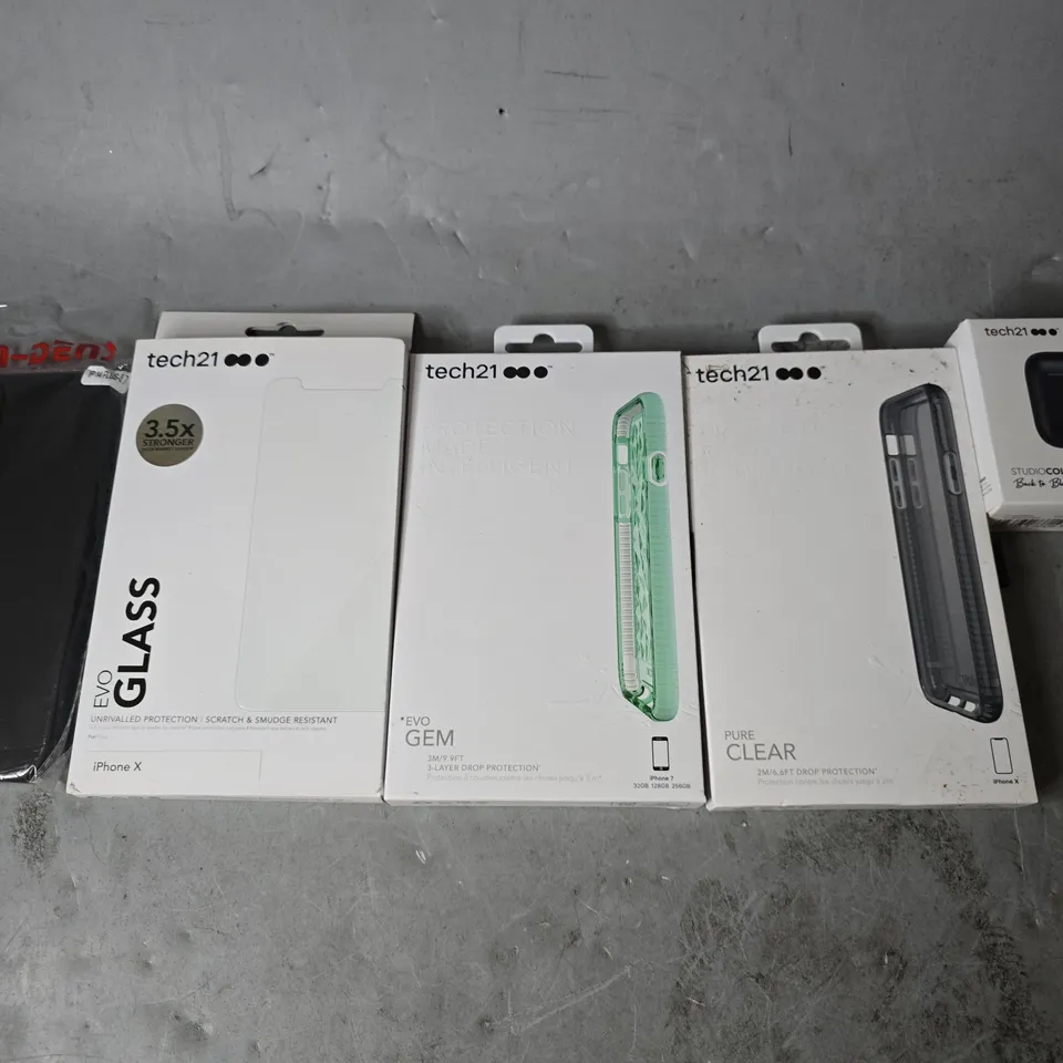 BOX OF APPROXIMATELY 50 PHONE CASES TO INCLUDE - TECH21 EVO GEM IPHONE 7 , TECH21 PURE CLEAR IPHONE X , TECH21 PHONE X GLASS ETC