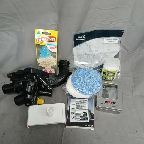 APPROXIMATELY 12 ASSORTED VEHICLE PARTS & ACCESORIES TO INCLUDE HOSE CLAMPS, WINDOW SCRATCH REMOVER, POLISH SCRUBS, ETC