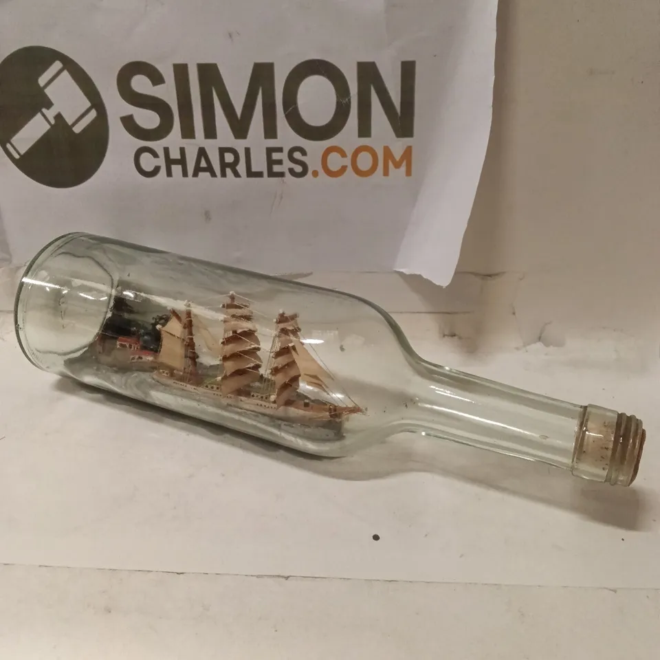 BOXED GLASS BOTTLE WITH SHIP-IN-A-BOTTLE ORNAMENT