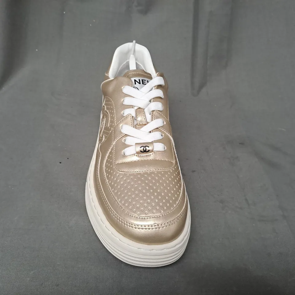 BOXED PAIR OF CHANEL SNEAKERS IN GOLD EU SIZE 39