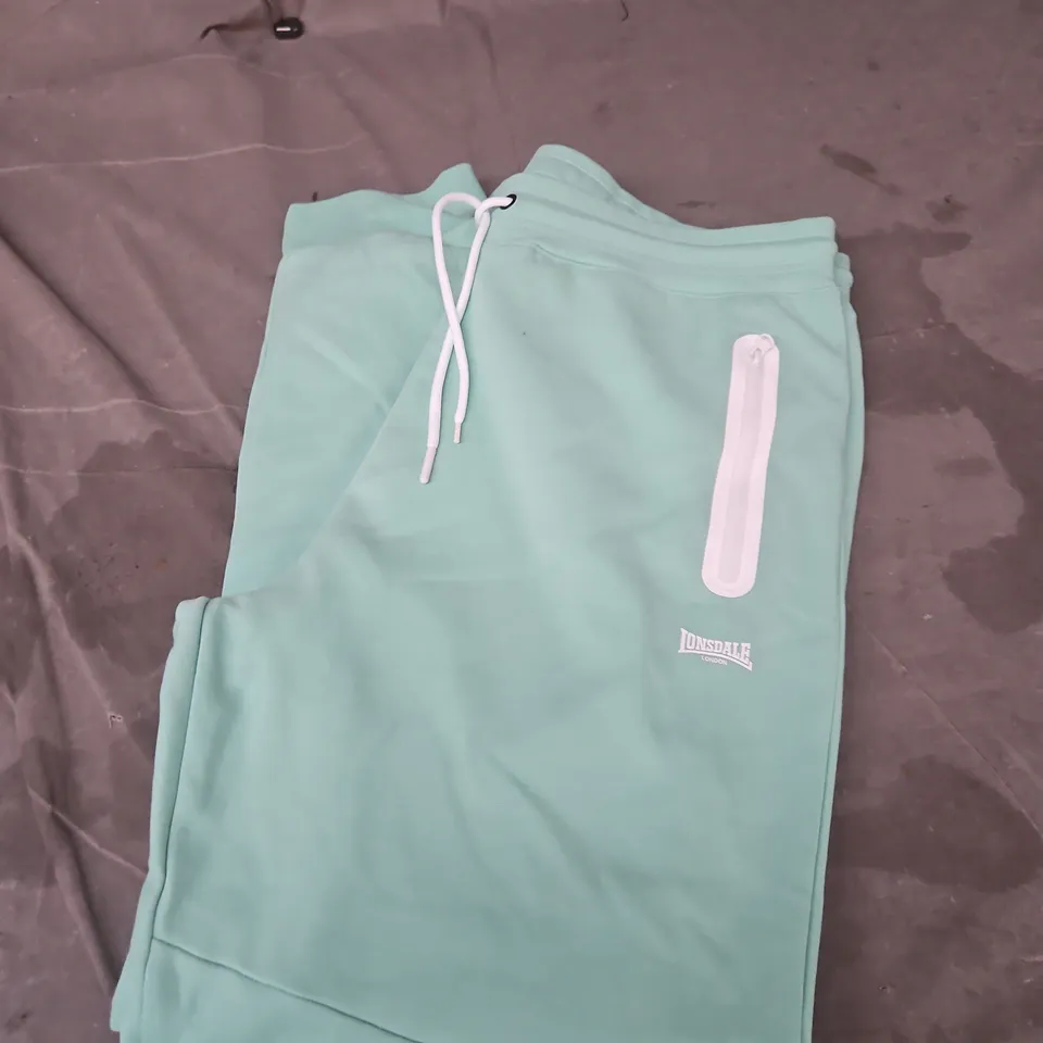 LONSDALE JOGGERS – MINT GREEN WITH DRAWSTRING WAIST AND THIGH ZIP POCKET SIZE L