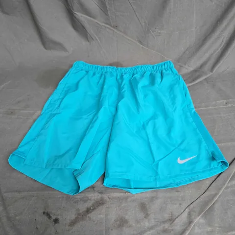 NIKE CHALLENGER SHORTS IN TEAL SIZE M
