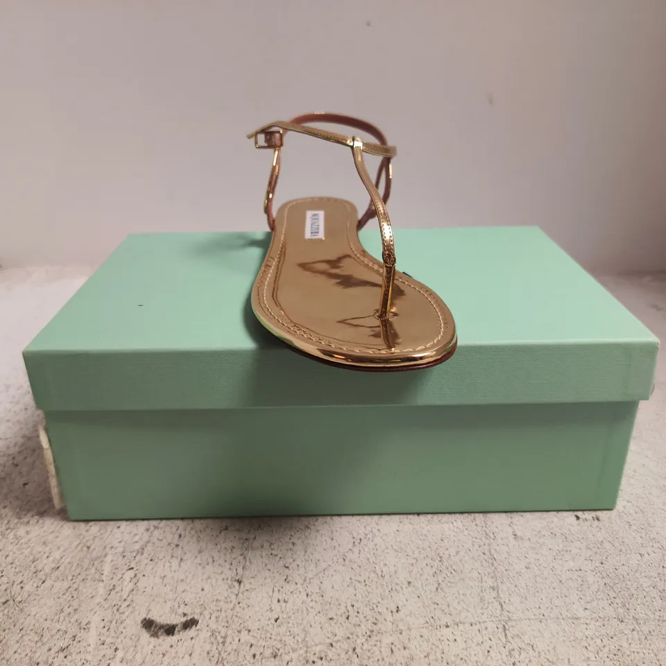 BOXED PAIR OF AQUAZZURA FLAT TOE-POST SANDALS IN METALLIC GOLD SIZE EU 39.5