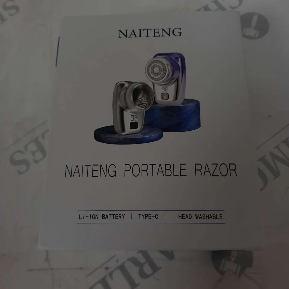 BOXED NAITENG PORTABLE RAZOR