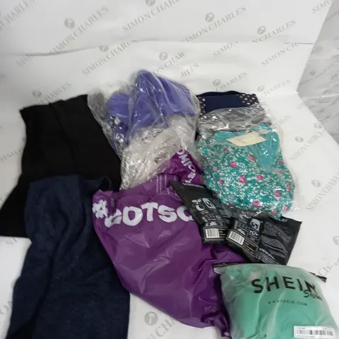 LARGE BOX OF ASSORTED CLOTHING ITEMS IN VARIOUS COLOURS AND SIZES INCLUDING TROUSERS , TOPS AND JUMPERS
