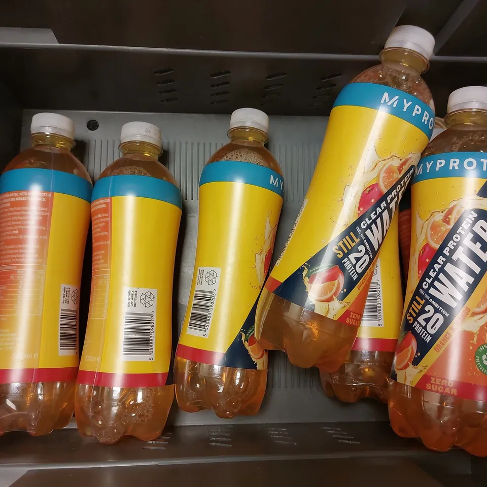 BOX OF APPROX 10 ITEMS TO INCLUDE TILZ COLLECTION COFFEE SYRUP AND MYPROTEIN STILL WATER