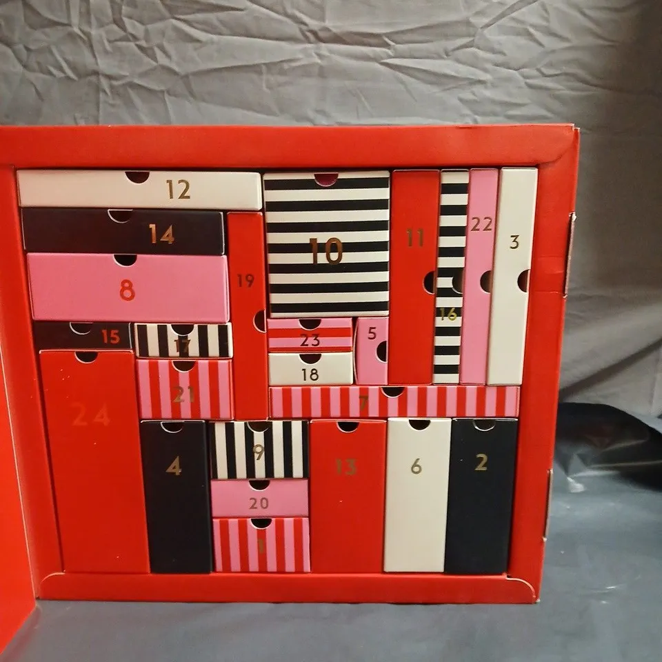 A LITTLE SOMETHING ADVENT CALENDAR – 24-DRAWER RED & WHITE STRIPED BOX