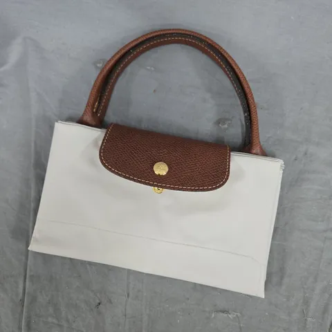 WHITE HANDBAG WITH BROWN LEATHER TOP FLAP AND HANDLES