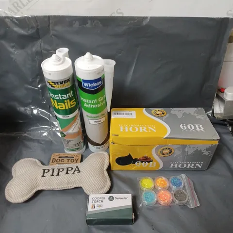 BOX OF APPROXIMATELY 20 ASSORTED HOUSEHOLD ITEMS TO INCLUDE DOG TOY, ELECTROMAGNETIC HORN AND INSTANT NAILS