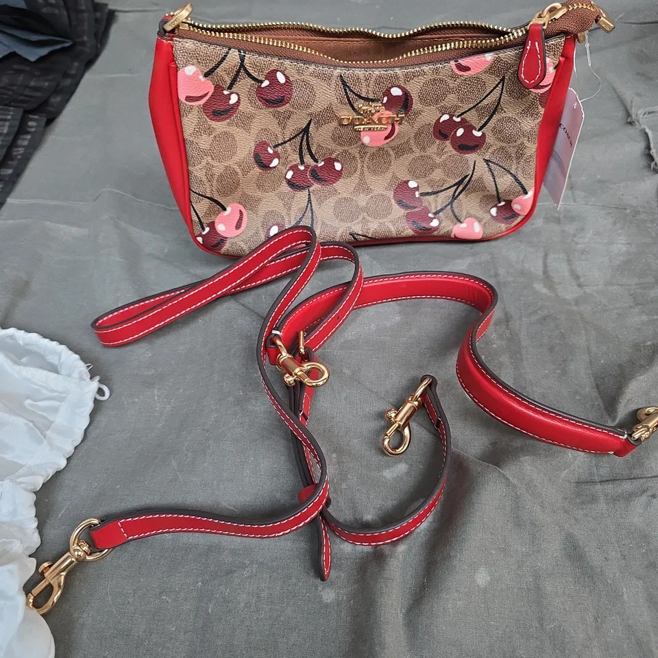 COACH CHERRY PRINT CROSSBODY BAG WITH RED LEATHER TRIM