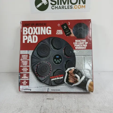 WINNING BOXING PAD – LIGHT UP, MUSICAL, WALL-MOUNTED BOXING GAME (INCLUDES 2 BOXING GLOVES)