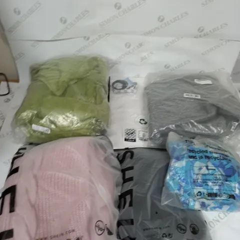 LARGE BOX OF ASSORTED CLOTHING ITEMS IN VARIOUS COLOURS AND SIZES INCLUDING TROUSERS , TOPS AND JUMPERS