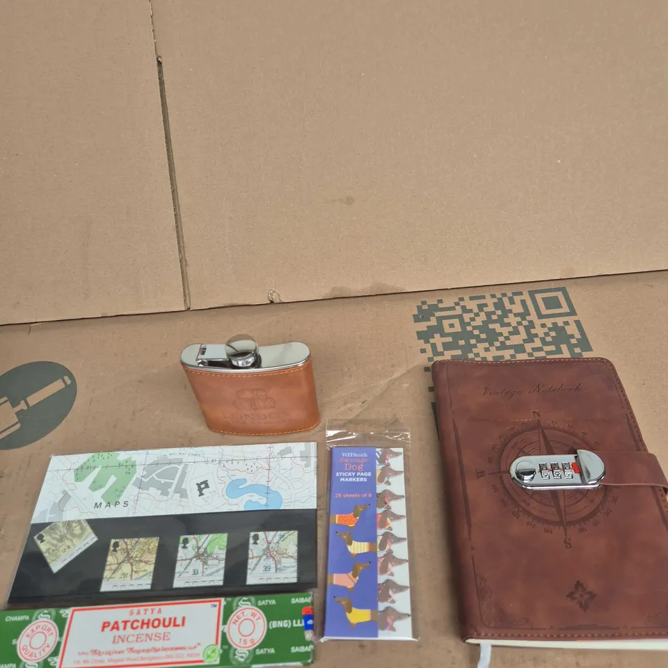 TOTE OF APPROXIMATELY 10 ASSORTED ITEMS INCLUDING SATYA PATCHOULI INCENSE, LONDON CASK TRADERS HIP FLASK AND ROYAL MINT STAMPS MAPS