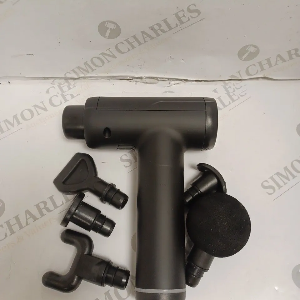 BOXED DESIGNER MASSAGE GUN. 