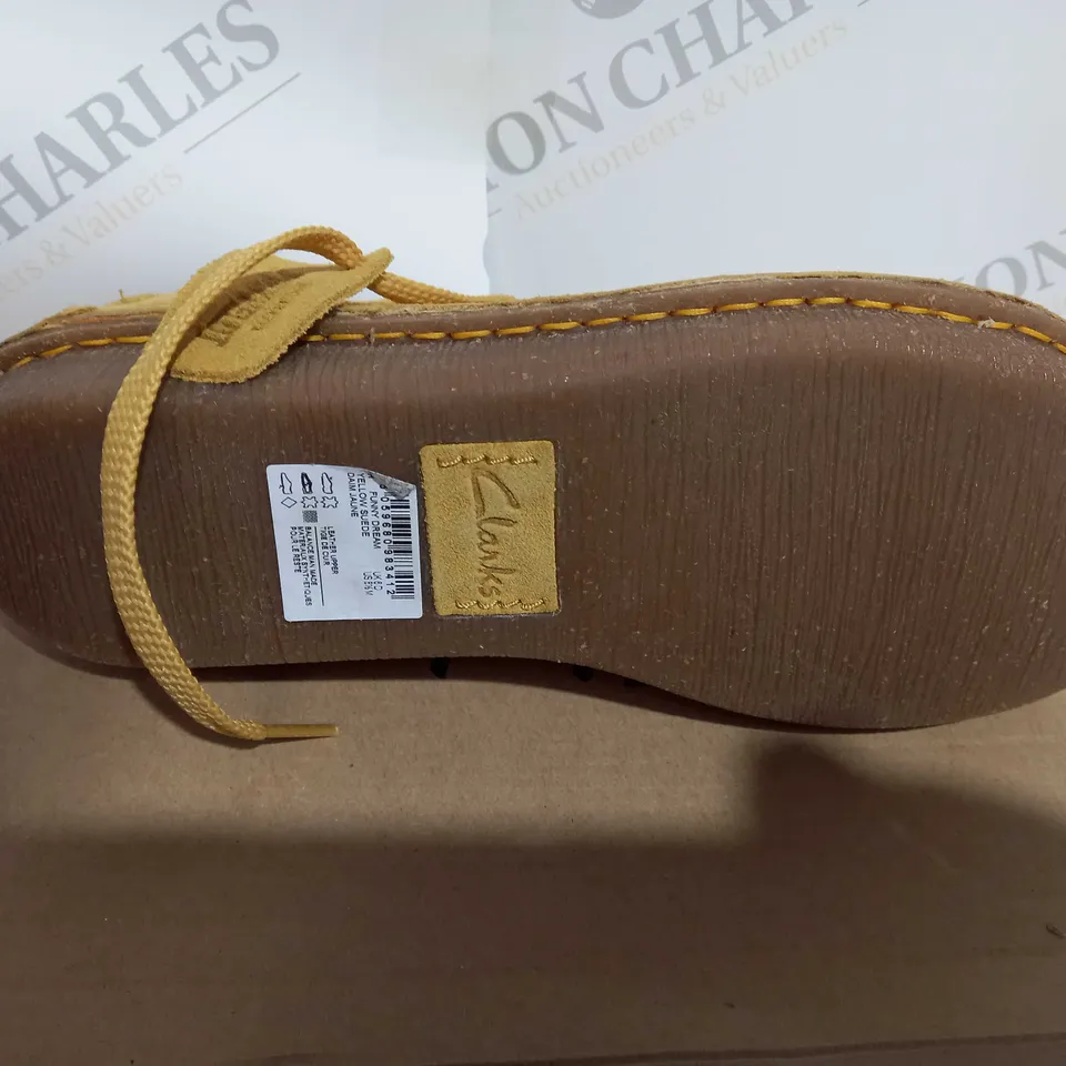 BOXED PAIR OF CLARKS FUNNY DREAM YELLOW SUEDE IN SIZE 6 