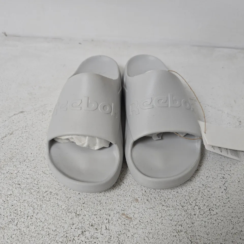 UNBOXED PAIR OF REEBOK CLEAN SLIDES IN GREY - UK 5