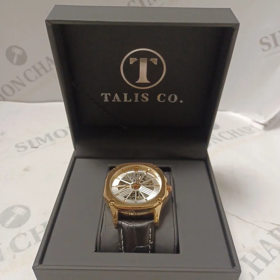 MEN’S TALIS CO 9185 AUTOMATIC SKELETON WATCH – BLACK DIAL – GOLD COLOUR CASE – GLASS EXHIBITION CASE BACK – LEATHER STRAP