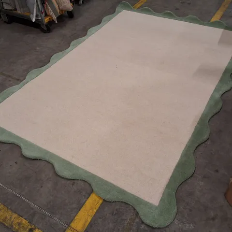 BEIGE AREA RUG WITH SAGE GREEN SCALLOPED BORDER APPROXIMATELY 200×290CM