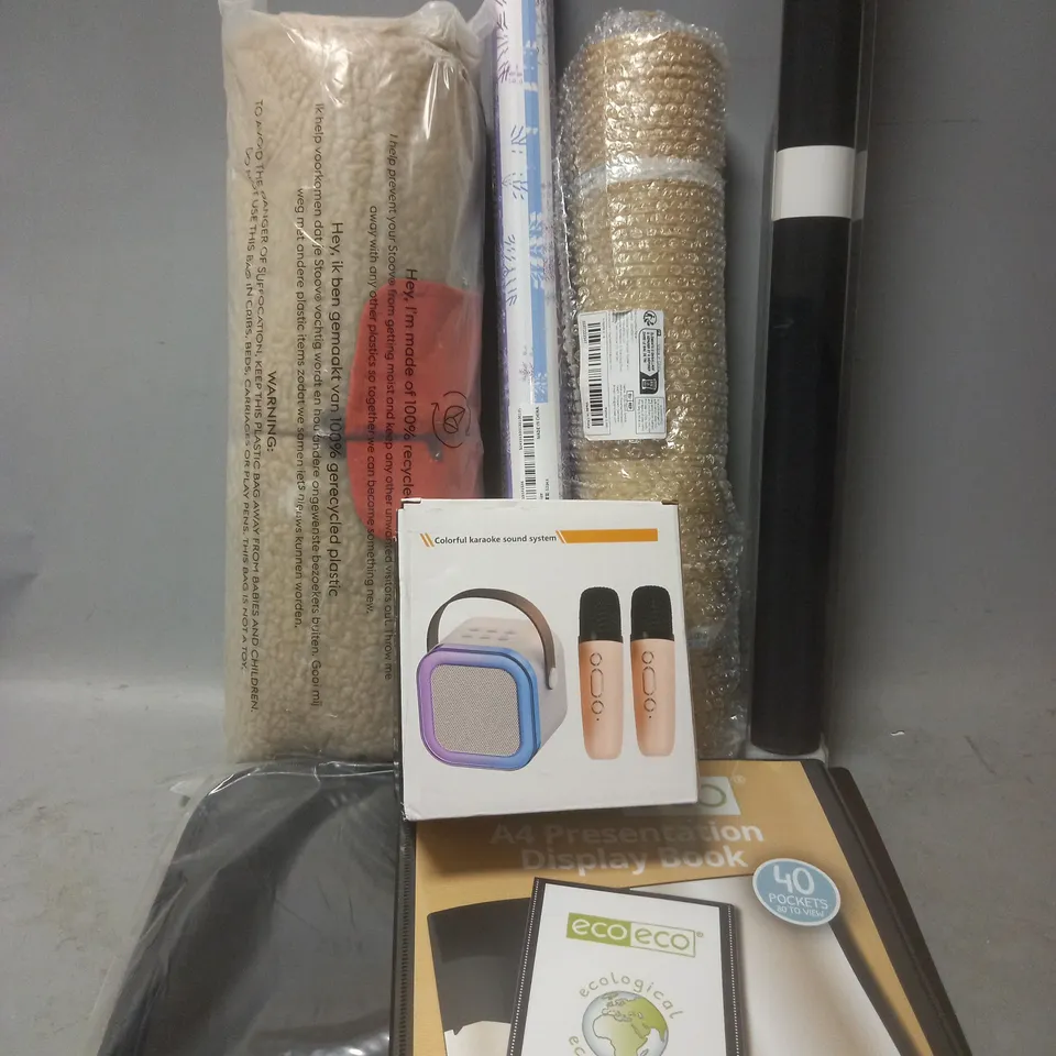 LARGE BOX OF APPROXIMATELY 12 ASSORTED ITEMS TO INCLUDE - KARAOKE MACHINE - BLACKOUT ROLLER BLIND - A4 PRESENTATION DISPLAY BOOK - ETC