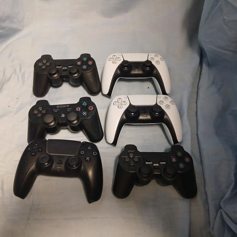 SONY PLAYSTATION CONTROLLERS – SET OF 6 GAMEPADS (4 BLACK, 2 WHITE) FOR VARIOUS GENERATIONS