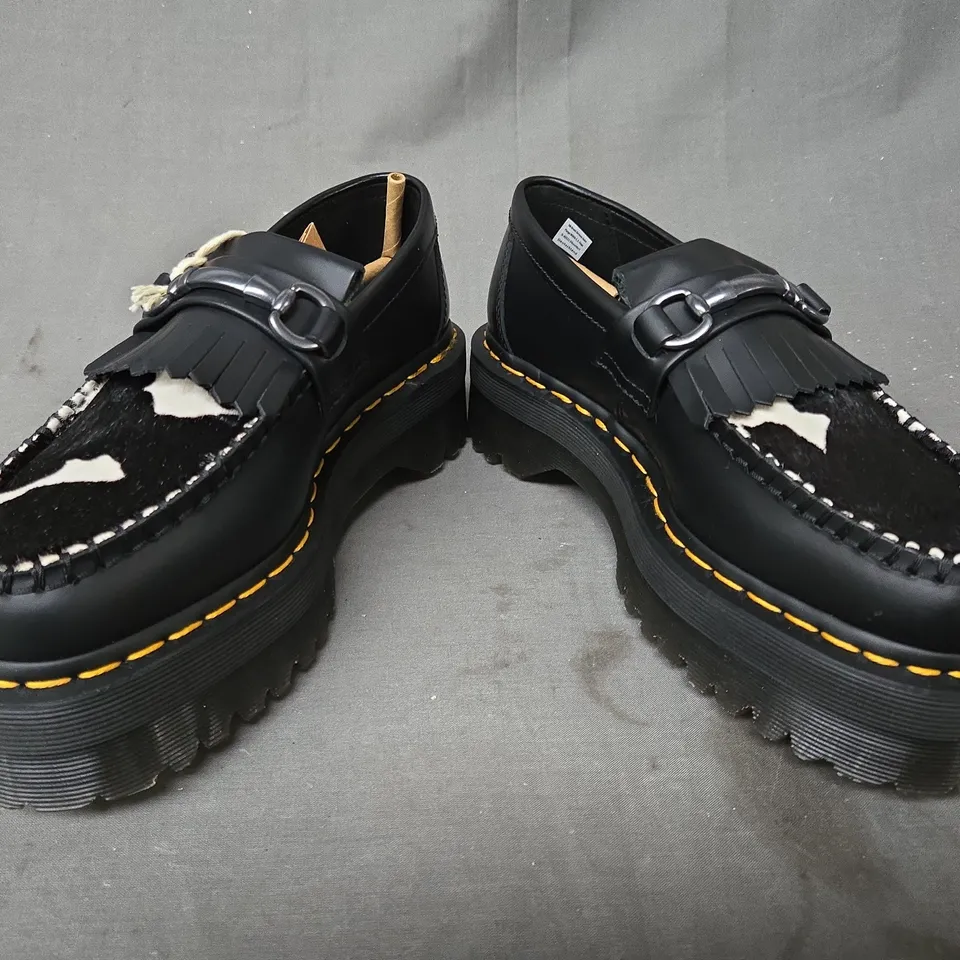 BOXED PAIR OF DR MARTENS ADRIAN SNAFFLE QUAD LOAFERS IN BLACK/COW PRINT UK SIZE 5