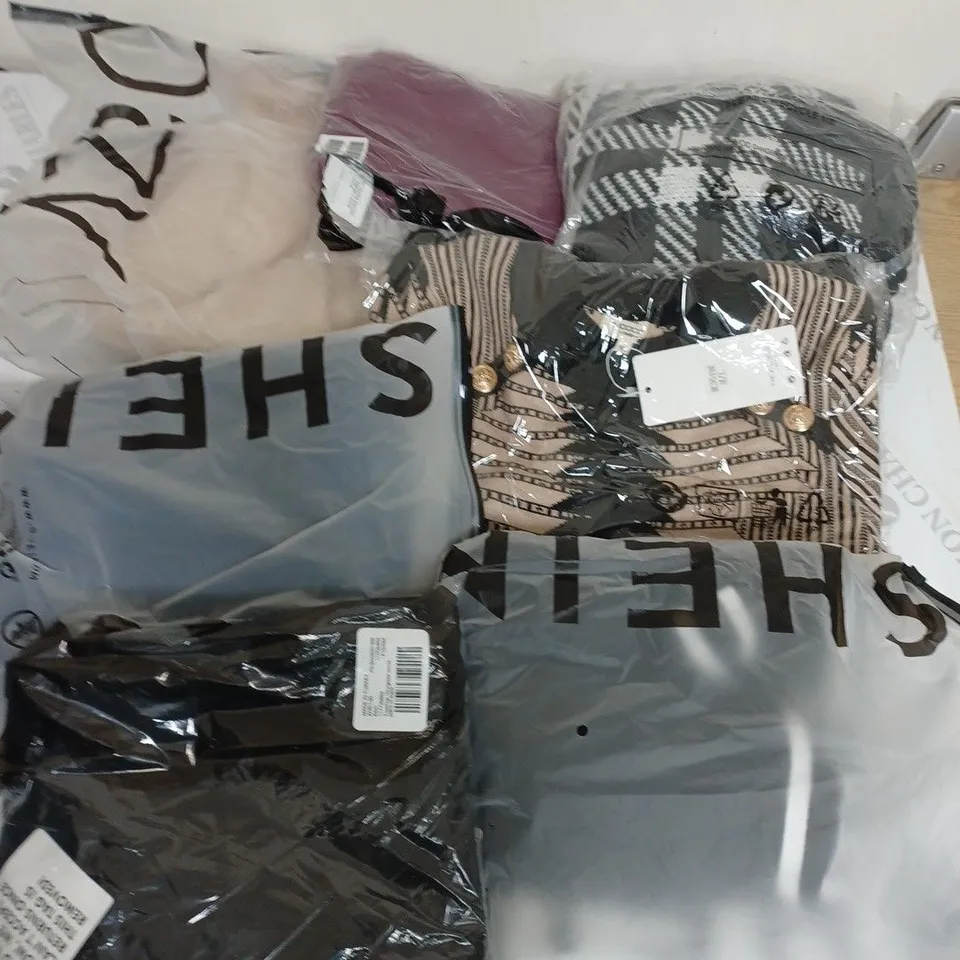 LARGE BOX OF ASSORTED CLOTHING ITEMS IN VARIOUS COLOURS AND SIZES INCLUDING TROUSERS , TOPS AND JUMPERS 