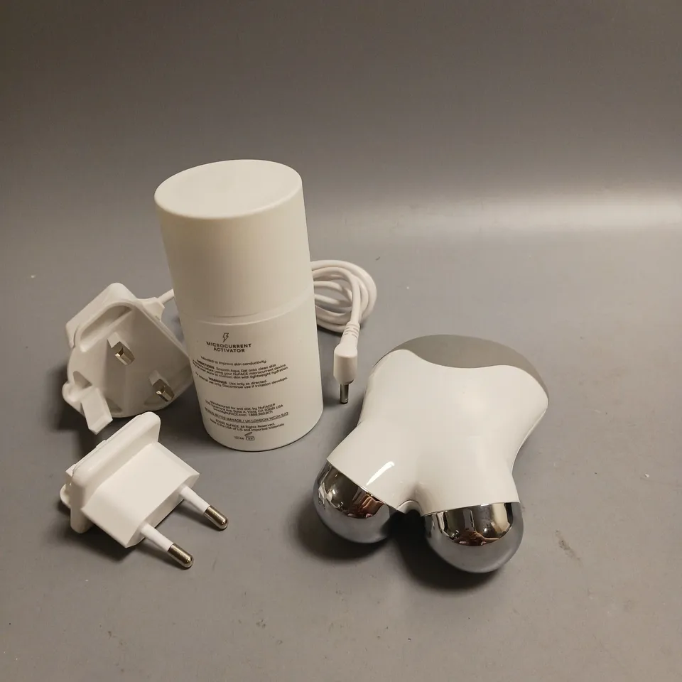 BOXED NUFACE MINI PETITE FACIAL TONING DEVICE WHITE AND GREY INCLUDES HYDRATING AQUA GEL, CHARGING CABLE AND 2 PLUG ADAPTORS