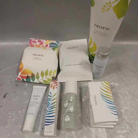 TROPIC SKINCARE LOT OF 8 ASSORTED SKINCARE PRODUCTS TO INCLUDE - CLEAR SKIES CLEANSING POWDER - JUICY GREENS TONING ESSENCE - NOURISHING HAIR CLEANSER - ETC