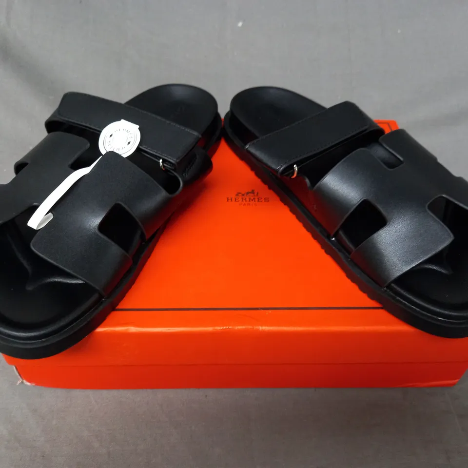 BOXED PAIR OF HERMES OPEN TOE FLAT SANDALS IN BLACK EU SIZE 38