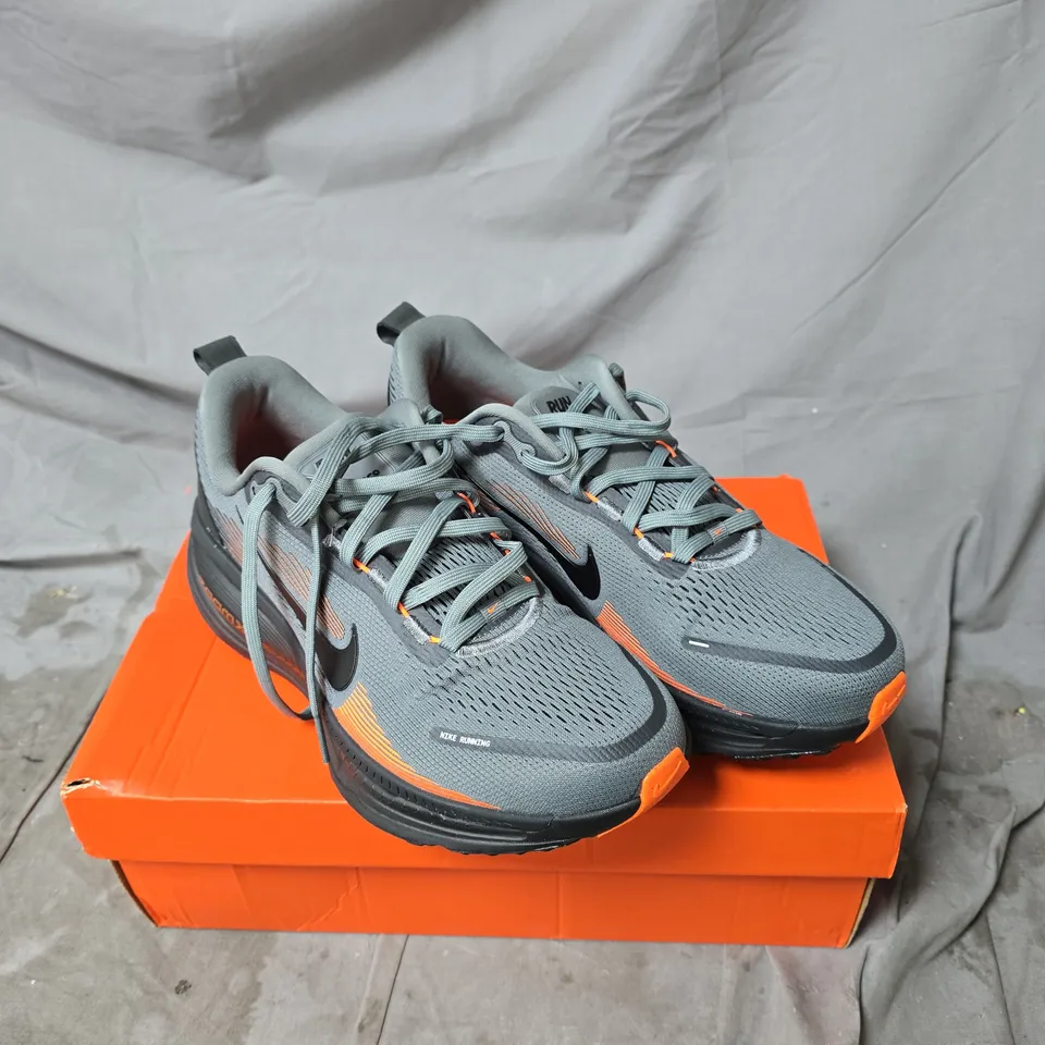 NIKE RUNNING SHOES - GREY WITH ORANGE ACCENTS SIZE 9