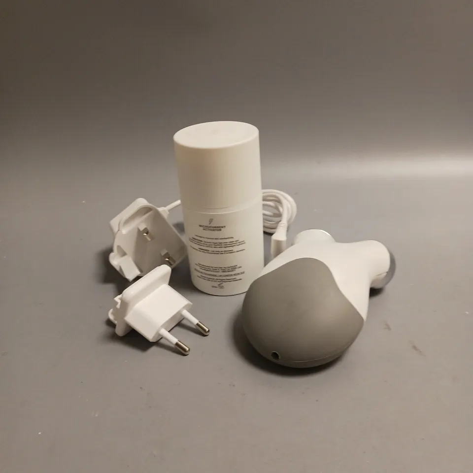 BOXED NUFACE MINI PETITE FACIAL TONING DEVICE WHITE AND GREY INCLUDES HYDRATING AQUA GEL, CHARGING CABLE AND 2 PLUG ADAPTORS