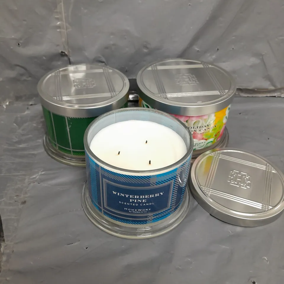 BOX OF APPROX 10 X2 ASSORTED HOMEWORX CANDLES TO INCLIDE HOLIDAY RIBBON CANDY, WINTERBERRY PINE AND EVERGREEN BIRCHWOOD