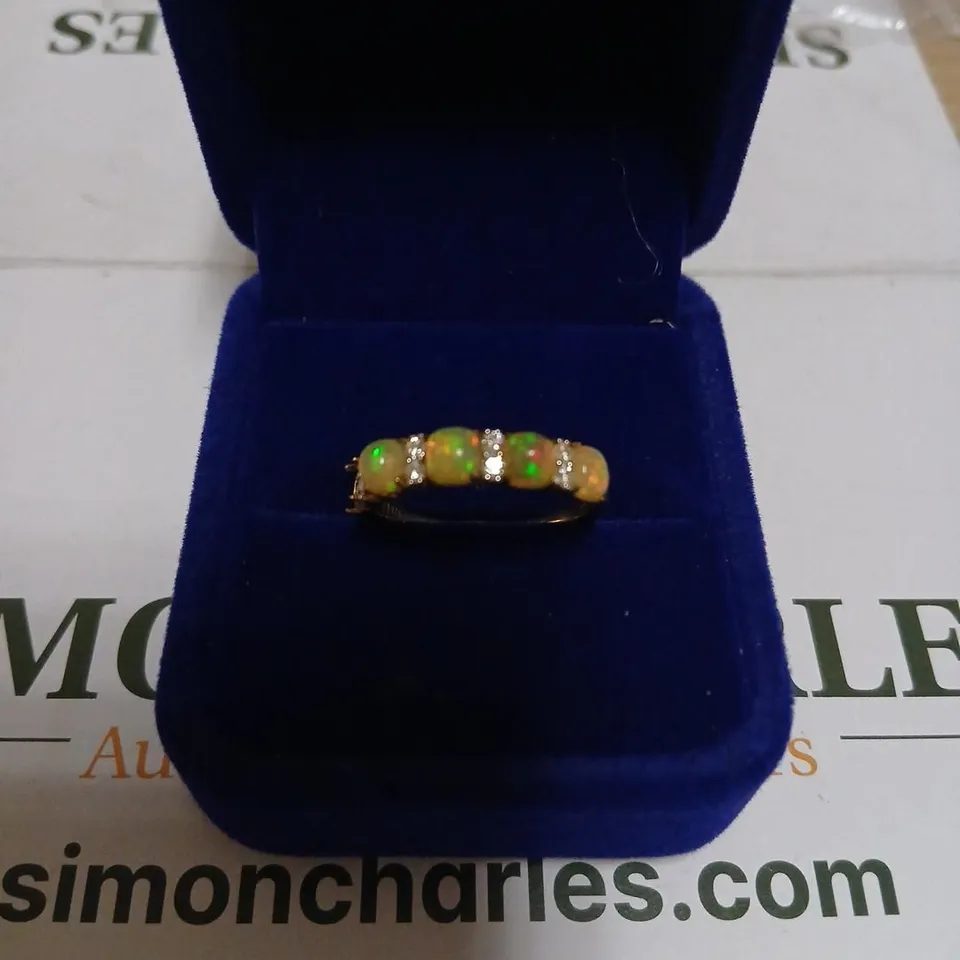 DIAMONIQUE OPAL EFFECT RING IN YELLOW GOLD 