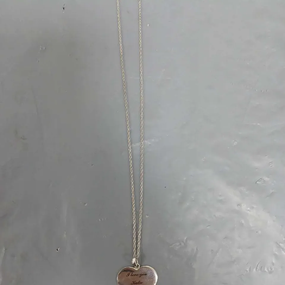 LADIES WHITE GOLD HEART NECKLACE. 
